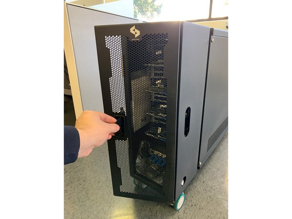 Turn the locking lever clock-wise and pull back to open the door