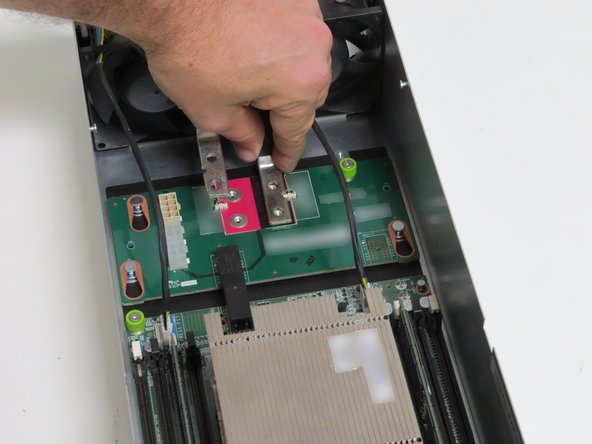 Seat the bus bar leads on the midplane board.