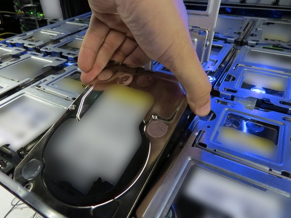 Avoid pushing the HDD to the extent of it contacting the tray chassis.