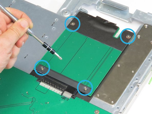 Unscrew (4) Phillips #1 screws.