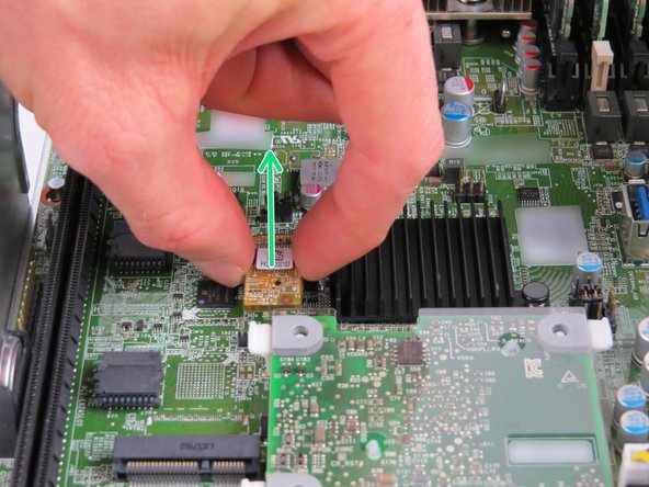 To remove, grip the module on each side, then pull upwards as shown.