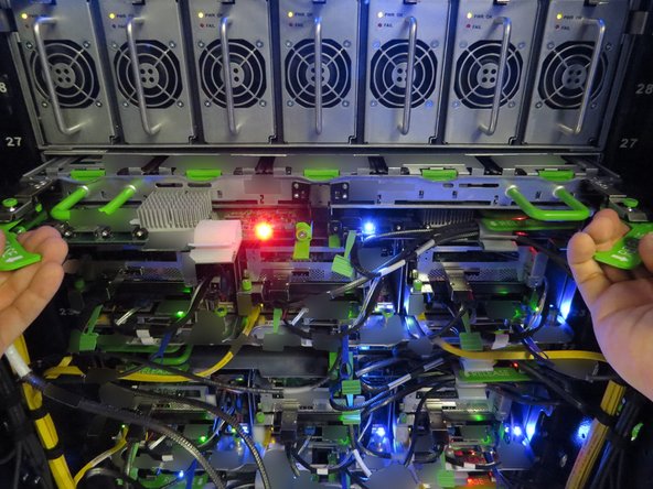 Pull the storage tray away from the chassis.