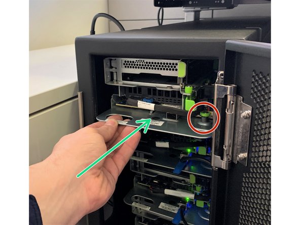 Make sure that server is commpletely inserted and green retention plunger is inserted into the second hole on the metal bracket