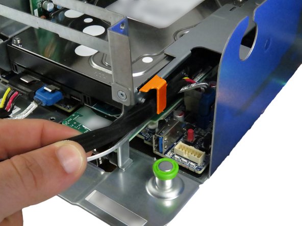 PCI riser card installation is opposite of the removal process.