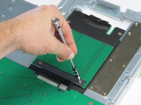Secure the power transition board back to the Open Vault tray chassis.