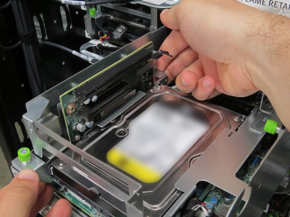 Engage the PCI riser card assembly, as shown.