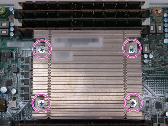 Loosen four Phillips #2 screws.