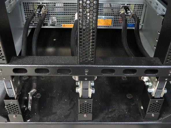 Connect the power lug cables to the Open Rack bus bars.