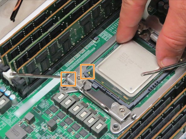 Align the arrow printed on the CPU with the arrow on the CPU retention bracket.