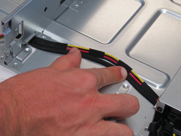 Push the left-most node SATA / power connector towards the right of the chassis, as shown.