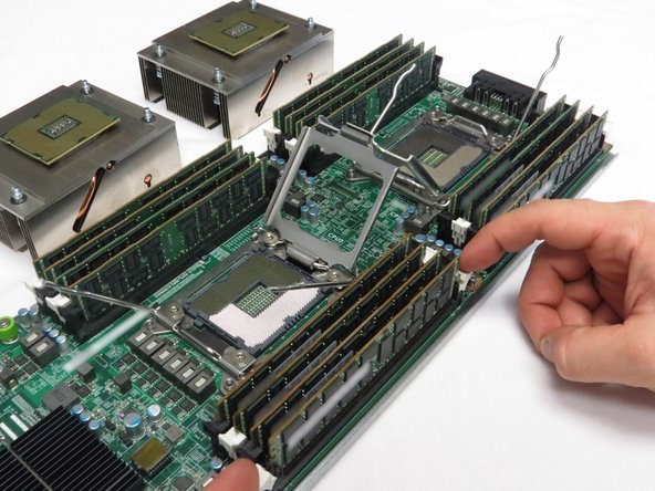 Remove each DIMM from its respective slot.