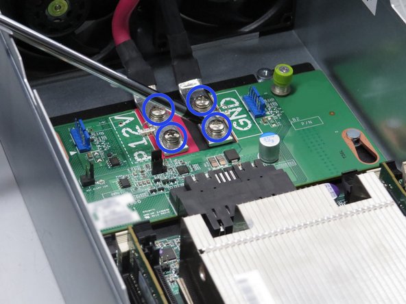 Unscrew (4) screws, as shown.