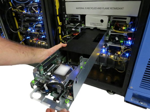 Slide the server back into the rack.