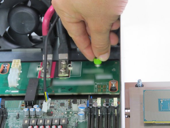 Loosen (1) midplane board thumbscrew.