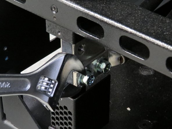 Make sure there is not live power on the bus bars before proceeding with this step.