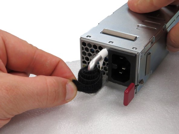 Unravel the new PSU's Velcro cable management.