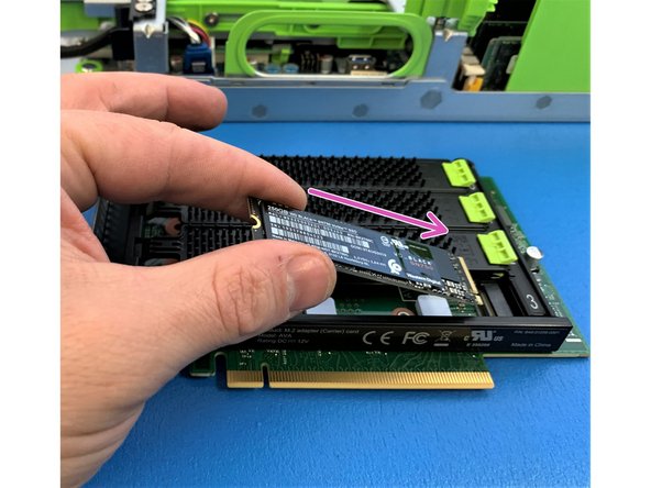 Gently insert the M.2 NVMe SSD into into the AVA M.2 NVMe carrier card.