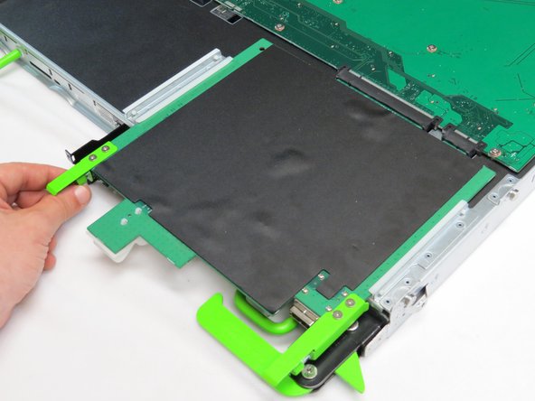 Loosen one thumbscrew.