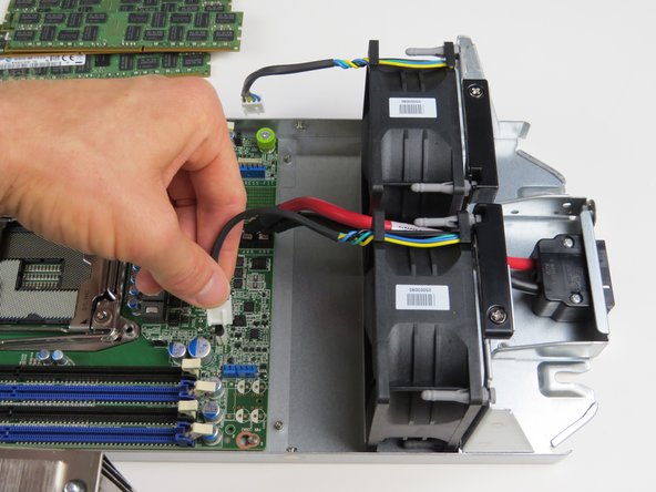 Connect (2) fan power cables.