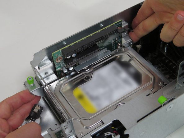 Engage the riser card assembly, as shown.