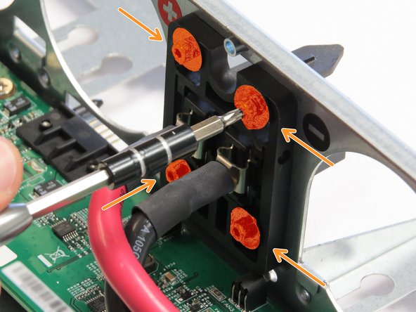 Unscrew four Torx T10 screws.