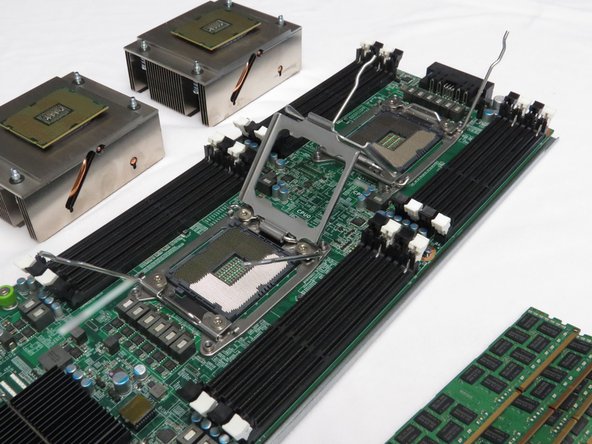 Place the DIMMs on the work surface adjacent to their respective channels.