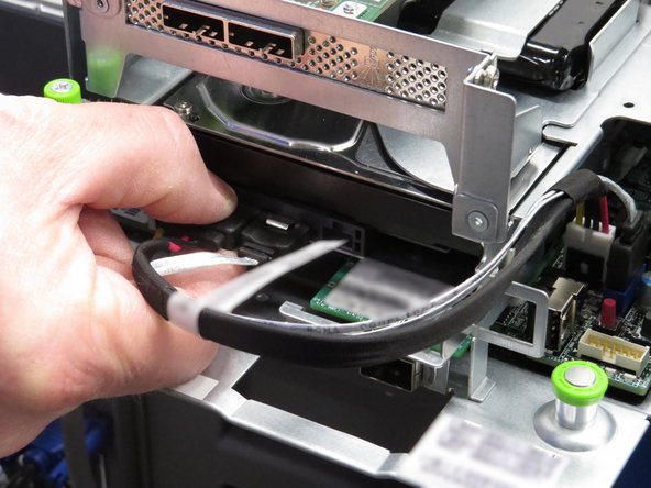 Disconnect the HDD SATA / Power cable, as shown.