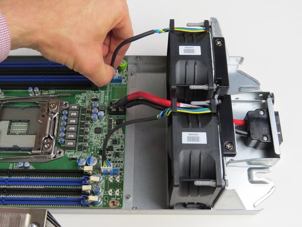 Disconnect (2) fan power cables.