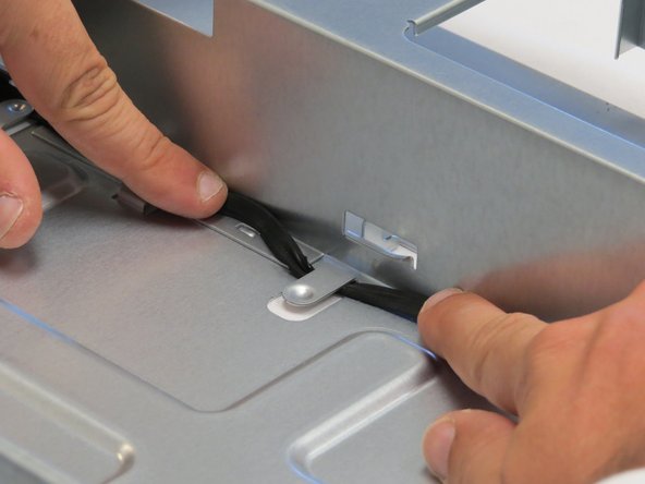 Slide the LED cable away each cable management tab in the chassis.