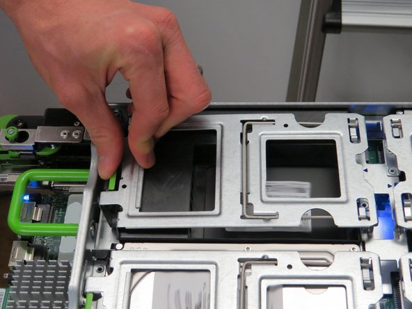 Close and secure the HDD locking gate.