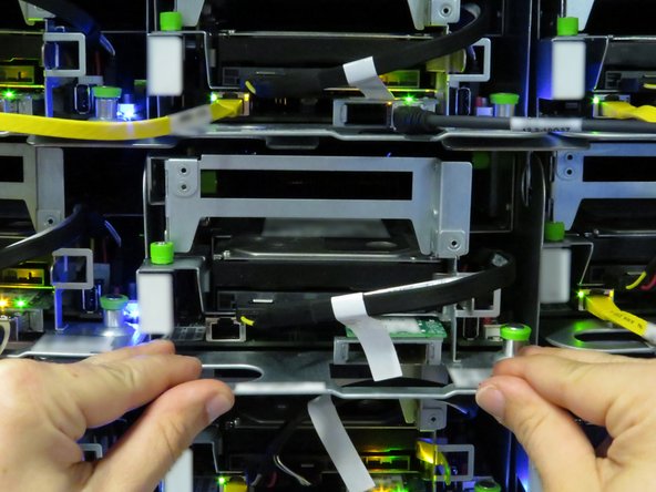 Slide the server into the rack.