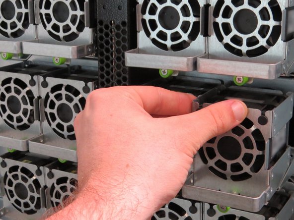 Place the fan on the fan tray.