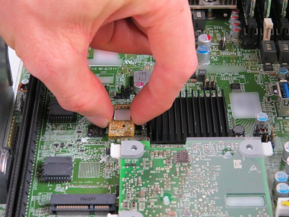 Once the TPM module connector has been aligned, insert it into the socket until resistance is felt.