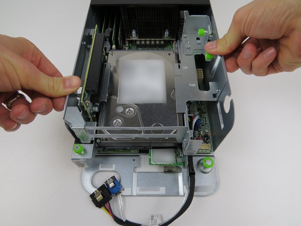 Press firmly to seat the PCIE riser card.