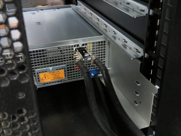 Connect the AC power cable to power shelf.