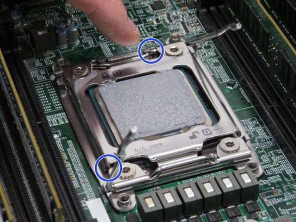Engage the CPU retention housing, as shown.