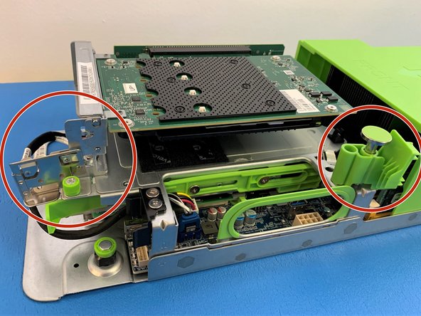 Close previously opened metal lock and the green retention plunger back to  their original positions.