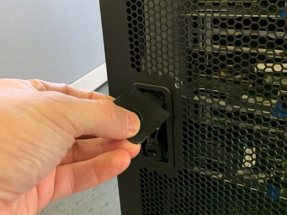 Turn the locking lever clock-wise and pull back to open the door