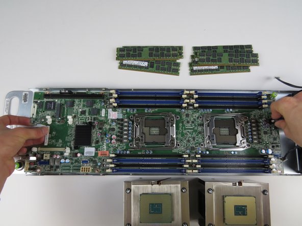 Lift the motherboard from the chassis.