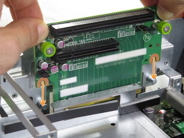 Align the guides on the on the PCIe riser card.