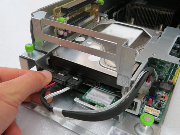 Connect the SATA / power cable to the hard disk drive.