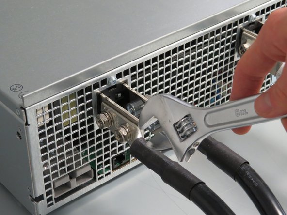 Install the six new power lug cables onto the power shelf.