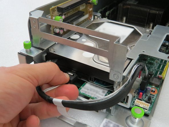 Connect the SATA / power cable to the hard disk drive.