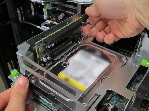 Push the PCI riser card assembly upwards.