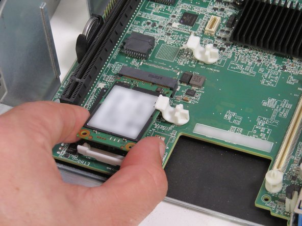 Pull the mSATA drive away from its socket.