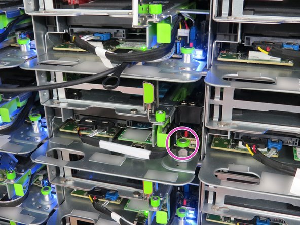 Pull the green retention plunger upwards and twist 90 degrees to lock in the upright position.