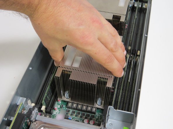 Lift the heatsink from the CPU socket.