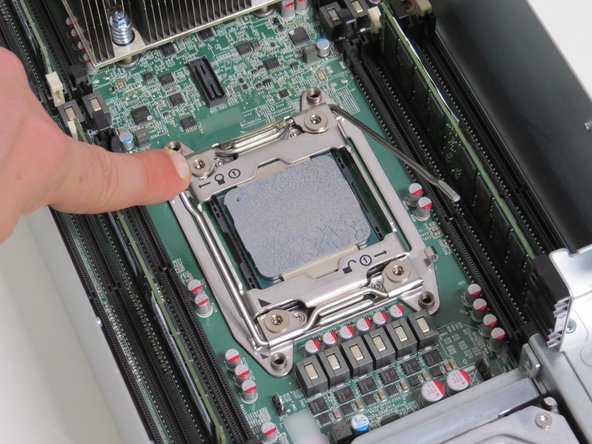 Unlatch the 'lock' retention lock second.