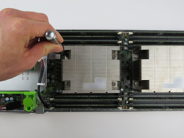 Ensure the heatsink screw posts are aligned with the CPU retention post holes.