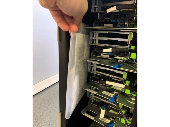 Remove 2 plastic bags containing power cables and quick start guide indicated by circles